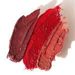 fluency (fluency beauty) vegan, plant-based makeup swatch deep brown, red, peachy nude colors
