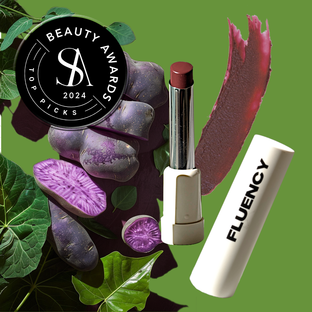 Fluency vegan makeup product called MultiStick from Fluency, Beauty showcased with a swatch of the product, purple potatoes, and spirulina, awarded a beauty award in 2024.
