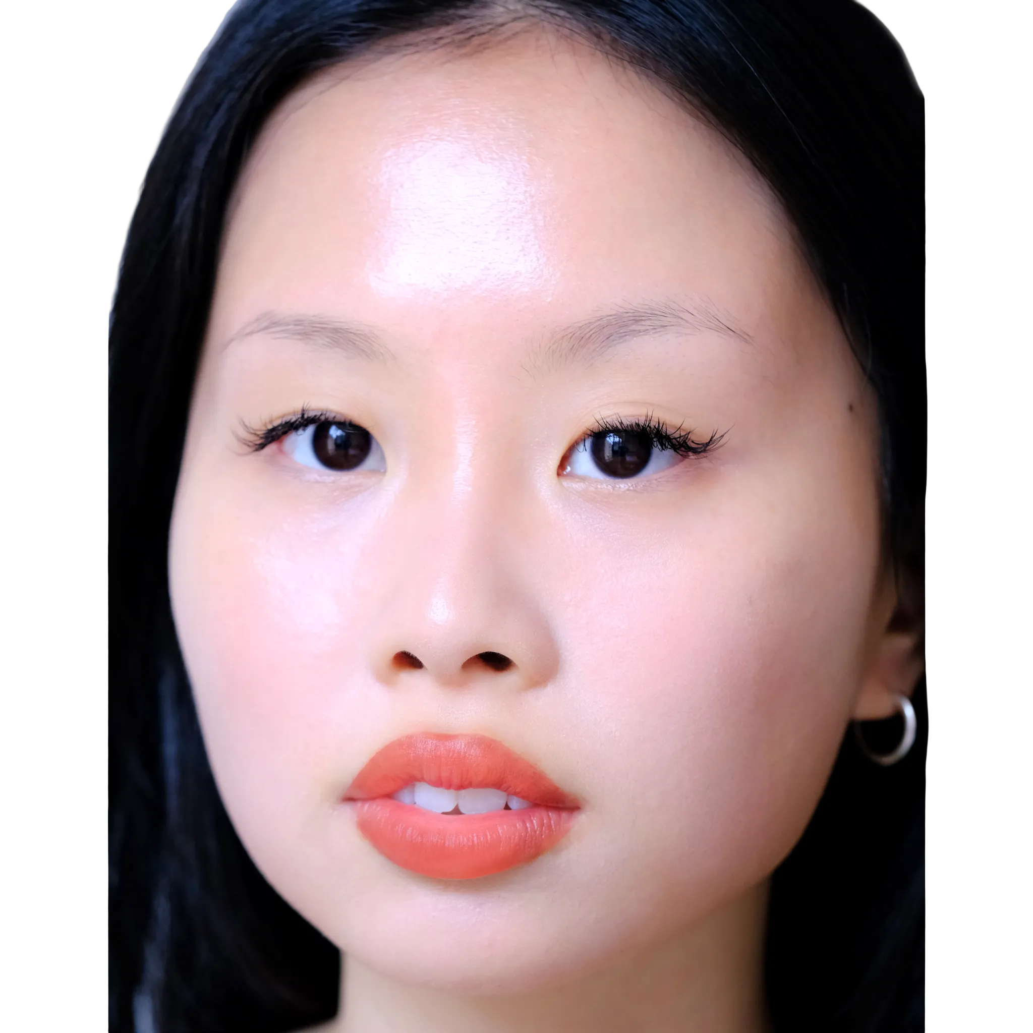 Close-up of a person with dark hair and red lipstick vegan makeup colored from superfoods fluency beauty 