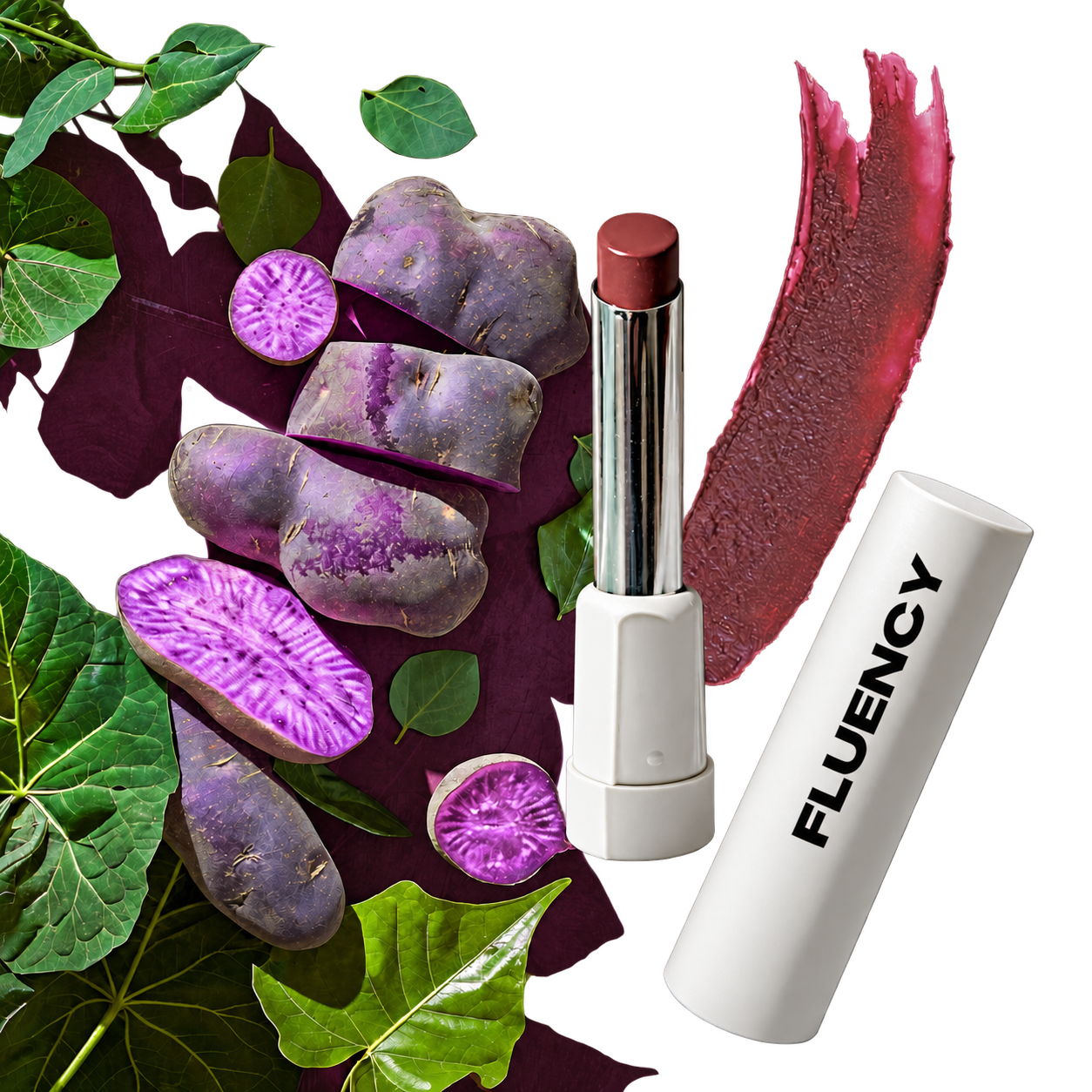 A lipstick tube with its cap removed stands beside a white cylindrical tube printed with the brand name FLUENCY. Purple sweet potato slices and green leaves are arranged around the product, with a pinkish-purple cosmetic smear behind it on a white background.