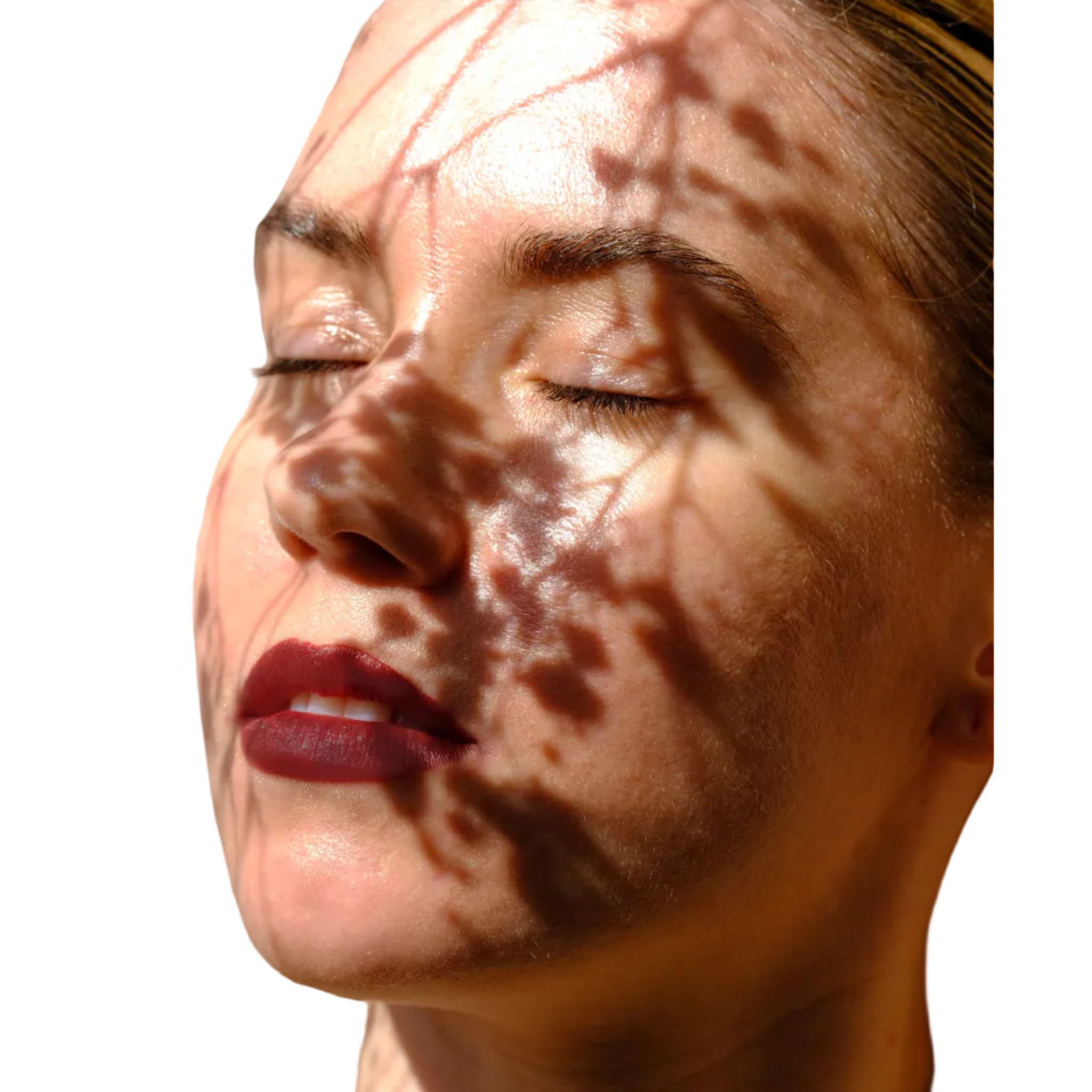 portrait female eyes closed, sunny, shadows of delicate flowers on face, wearing vegan brown lipstick makeup colored from superfoods like beets potatoes natural vegetables